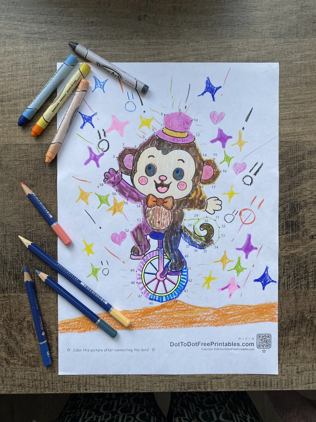 Quebra-cabeça de ligar pontos concluído: Macaco do Circo no Monociclo